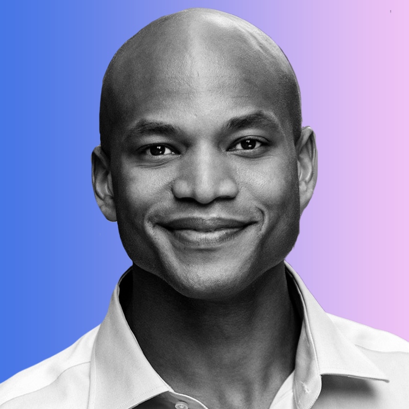 Headshot of Maryland Governor Wes Moore on a blue-purple gradient background.