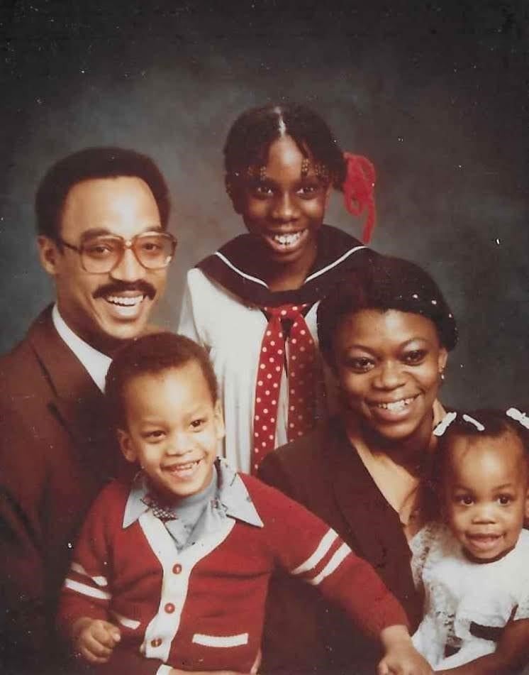 A young Wes Moore with his parents and siblings.