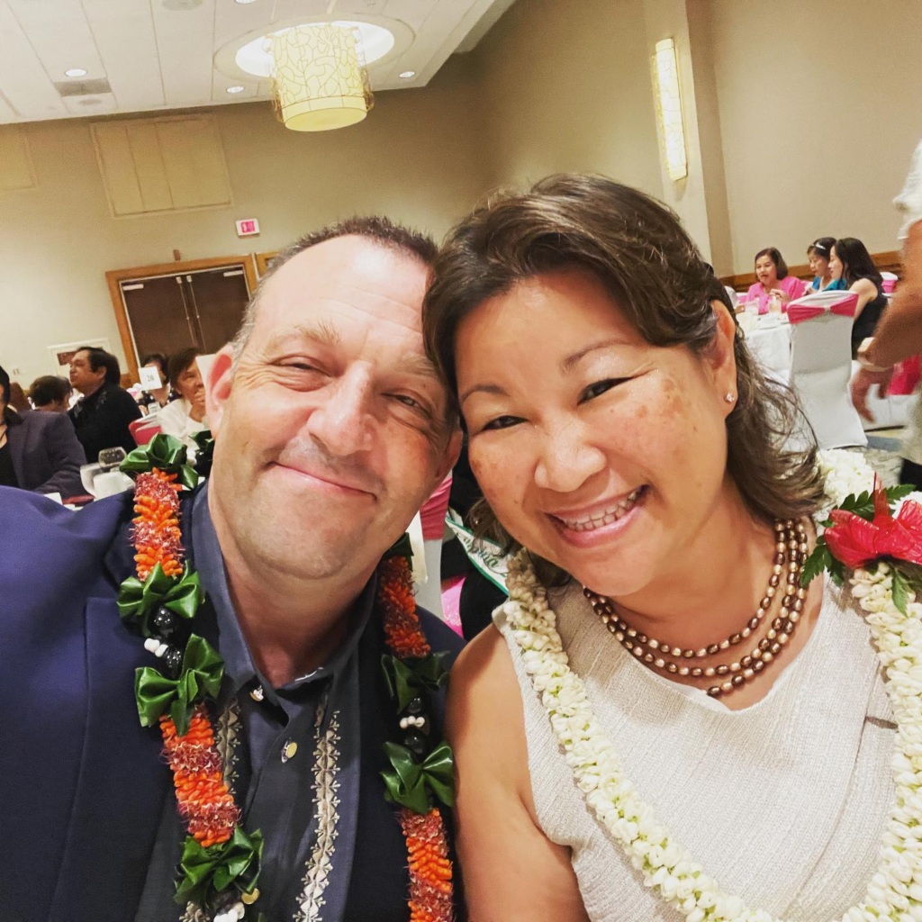 Hawai'i Governor Josh Green and his wife Jamie, smiling.