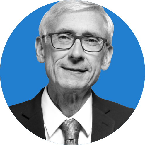 Headshot of Wisconsin Governor Tony Evers on a blue background.