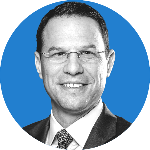 Headshot of Pennsylvania Governor Josh Shapiro on a blue background.